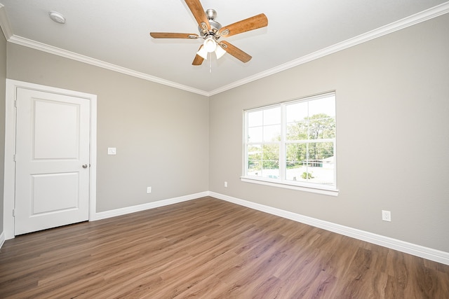 empty room featuring wood-type flooring, ceiling fan, and crown molding