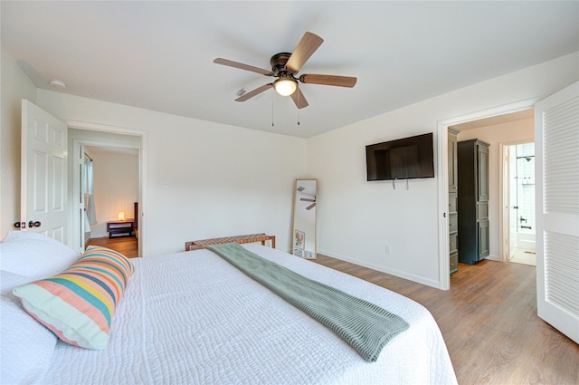 9932 Shady Dr, Houston, TX 77016 - bedroom featuring light wood-style floors, baseboards, and a ceiling fan
