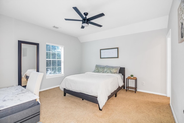 carpeted bedroom featuring ceiling fan and lofted ceiling