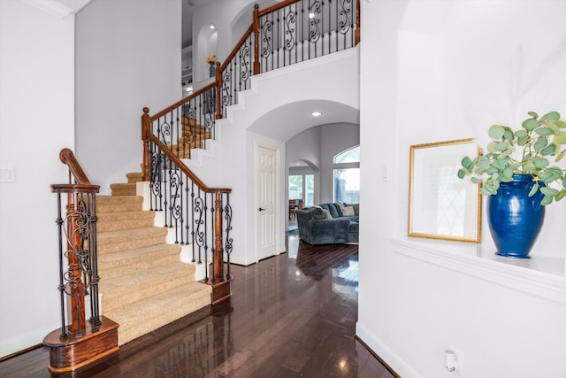 foyer entrance featuring a high ceiling