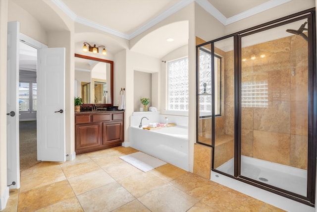 bathroom with ornamental molding, vanity, and independent shower and bath