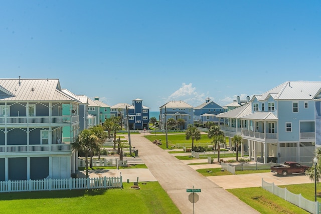 view of community featuring a yard