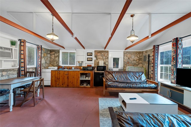 living room featuring carpet, lofted ceiling with beams, a wall mounted air conditioner, a fireplace, and sink