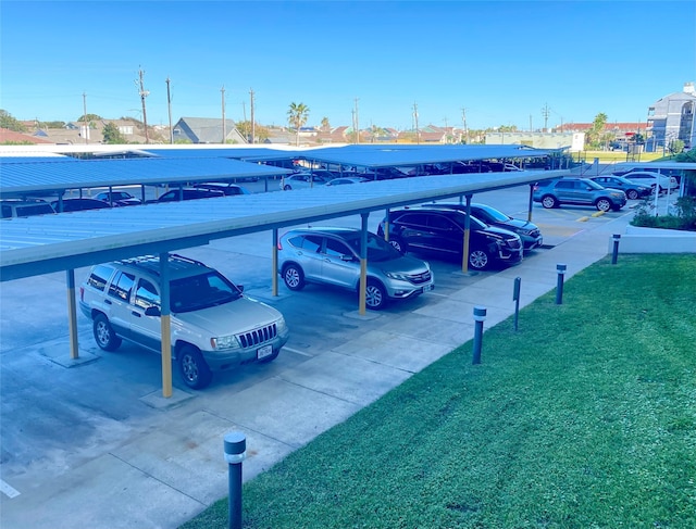 view of parking / parking lot featuring a carport