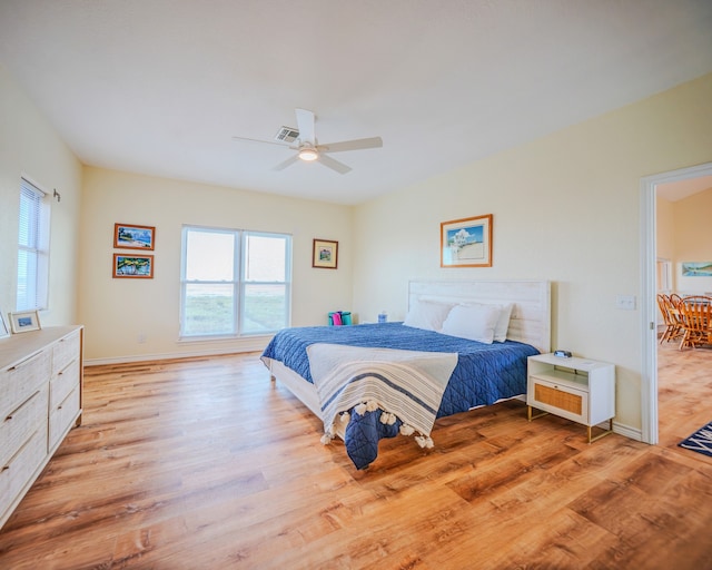 bedroom featuring light wood-type flooring and ceiling fan