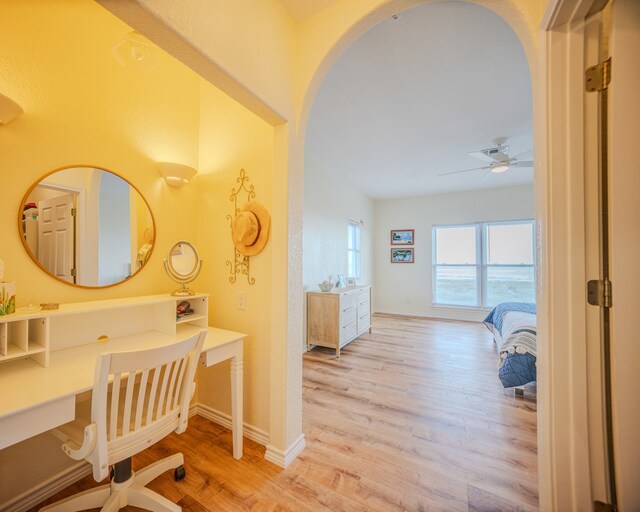 bathroom featuring hardwood / wood-style floors and ceiling fan