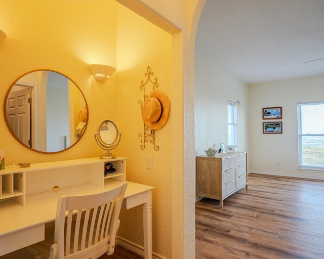 bathroom with hardwood / wood-style flooring