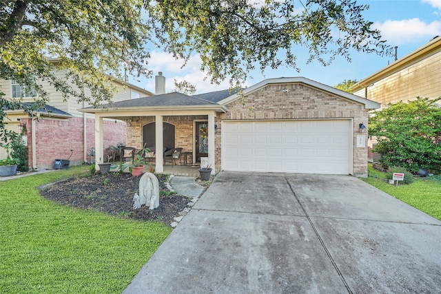 ranch-style home featuring a garage, a porch, and a front yard