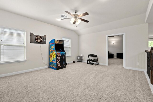 game room featuring lofted ceiling, a wealth of natural light, and carpet