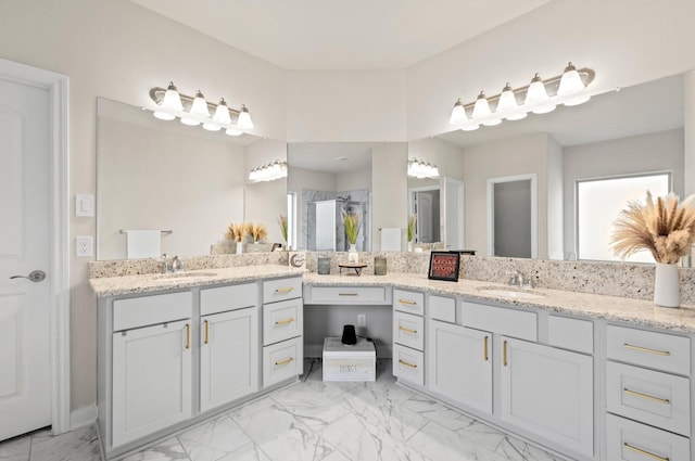 bathroom featuring walk in shower and vanity