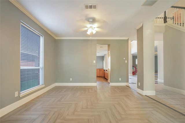 unfurnished room with ceiling fan, ornamental molding, and light parquet floors