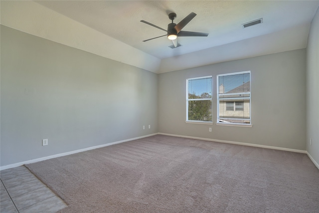 unfurnished room featuring light carpet and ceiling fan