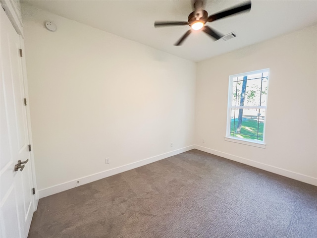 carpeted empty room with ceiling fan