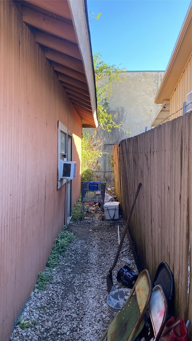 view of home's exterior with cooling unit