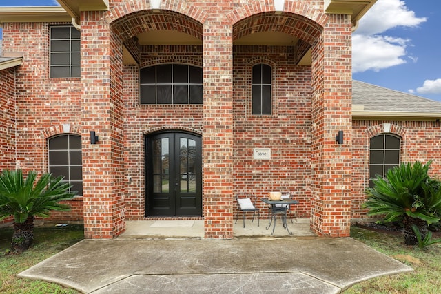 doorway to property featuring french doors