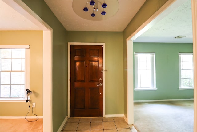 view of carpeted entryway