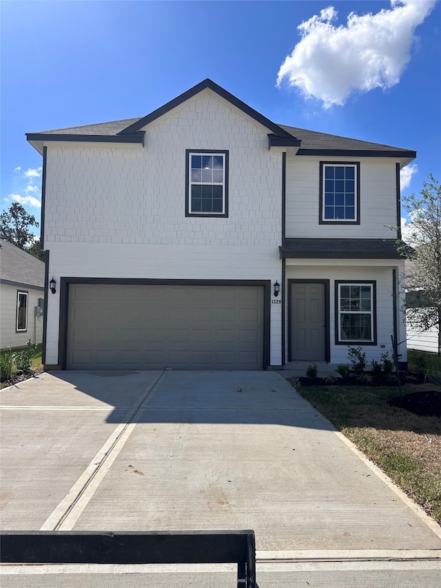 front of property featuring a garage