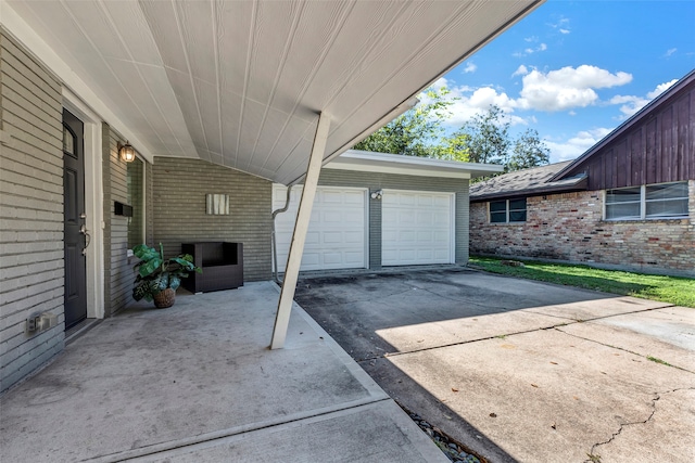 view of patio / terrace with a garage