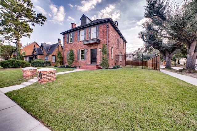 view of front of home with a front lawn