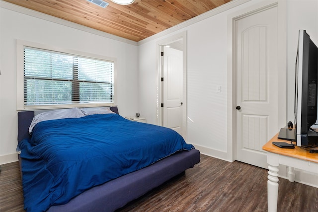 bedroom featuring ornamental molding, wooden ceiling, and dark wood-type flooring