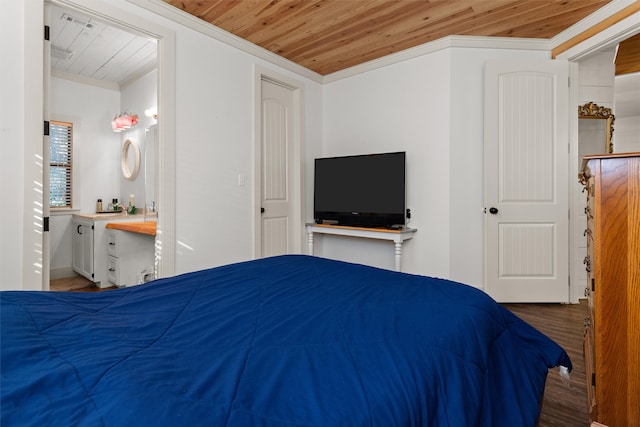 bedroom featuring connected bathroom, crown molding, wooden ceiling, and hardwood / wood-style flooring