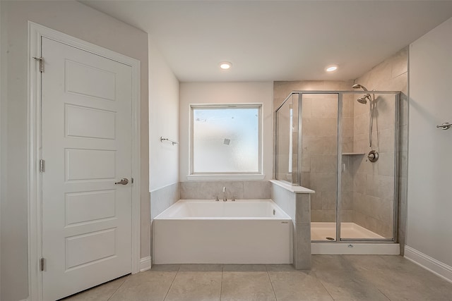 bathroom featuring tile patterned floors and plus walk in shower