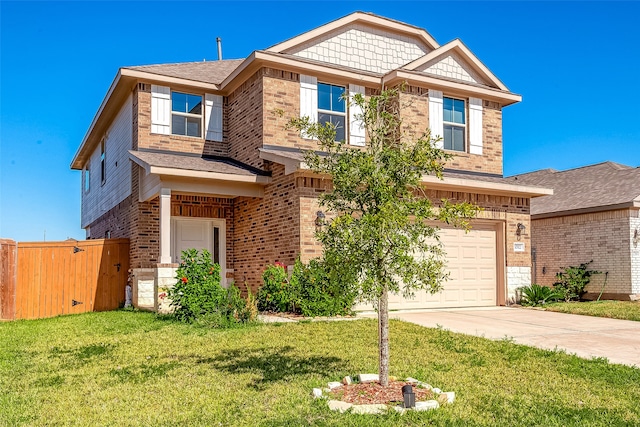 craftsman-style home featuring a garage and a front lawn