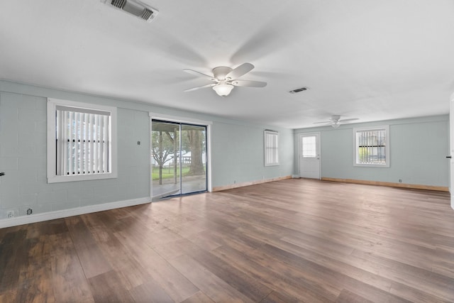 empty room featuring hardwood / wood-style flooring and ceiling fan