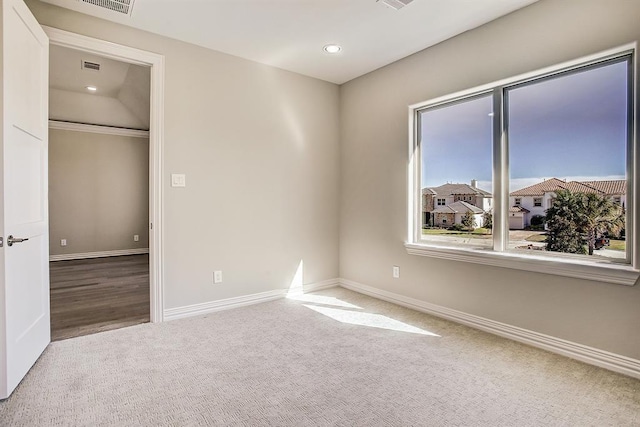 unfurnished bedroom featuring carpet floors and a closet