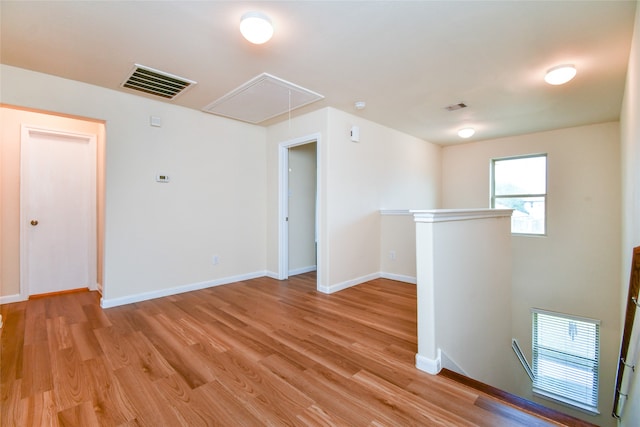 empty room with light wood-type flooring