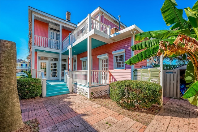 exterior space featuring a balcony