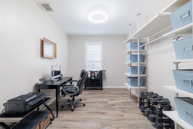 home office featuring light hardwood / wood-style flooring