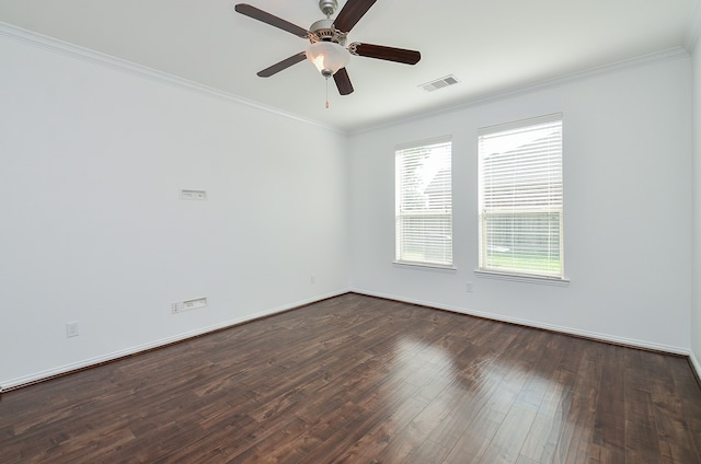 unfurnished room featuring ceiling fan, dark hardwood / wood-style floors, and crown molding