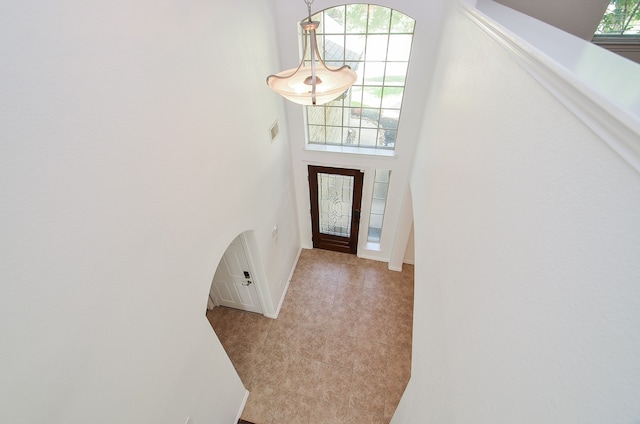 entryway featuring light tile patterned floors