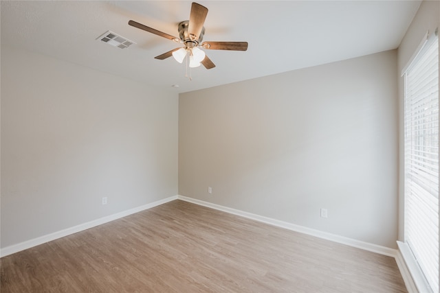 unfurnished room with light hardwood / wood-style floors and ceiling fan