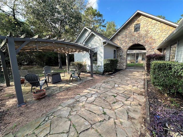 view of patio featuring a pergola