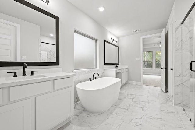 bathroom featuring vanity, shower with separate bathtub, and ceiling fan