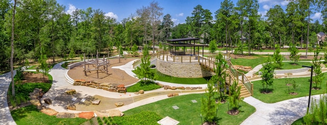 view of home's community with a playground