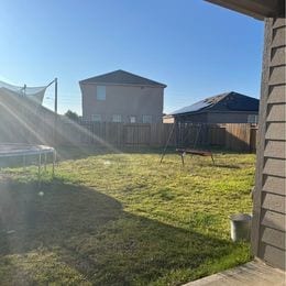 view of yard featuring a trampoline