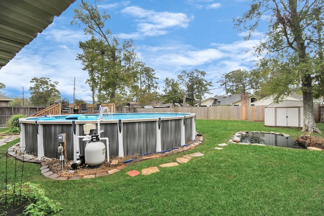 view of yard with a fenced in pool and a storage shed