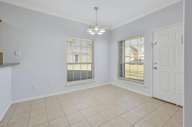 unfurnished dining area featuring a notable chandelier, ornamental molding, and light tile patterned floors