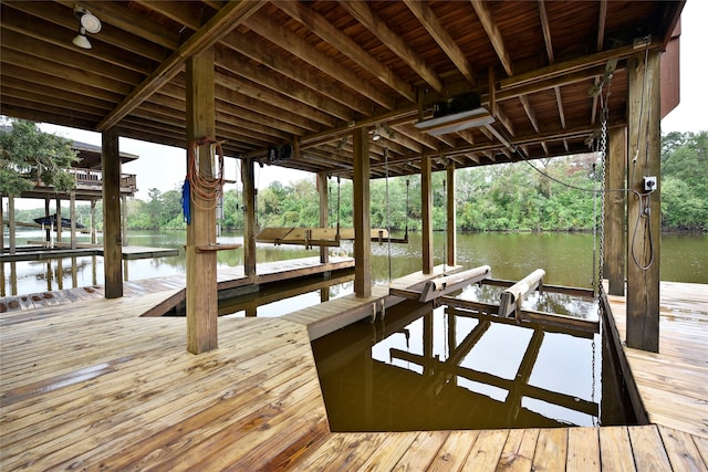 dock area featuring a water view