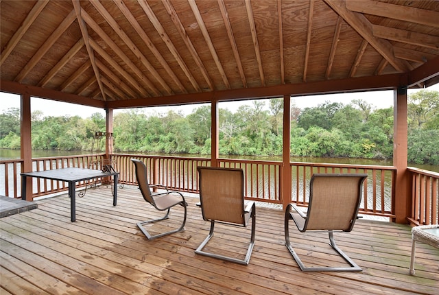 wooden terrace featuring a gazebo