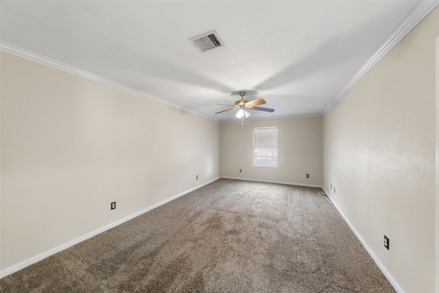 carpeted spare room featuring ceiling fan and crown molding