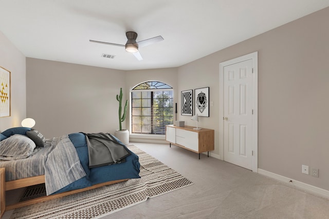 carpeted bedroom with ceiling fan