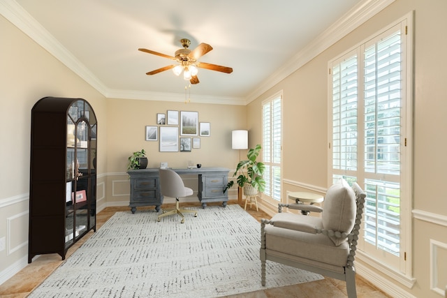 home office featuring ceiling fan and ornamental molding