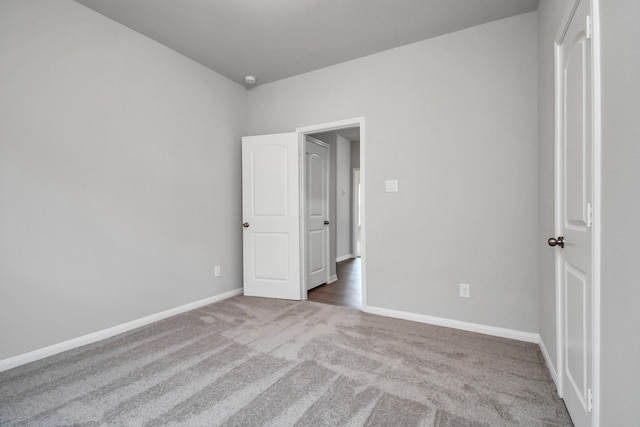 unfurnished bedroom featuring carpet floors