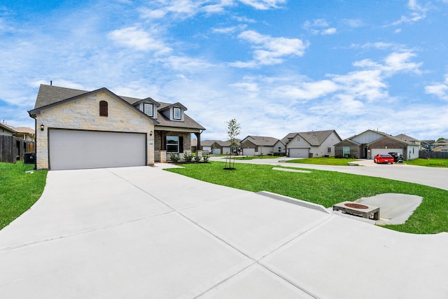 view of front of property with a garage and a front yard