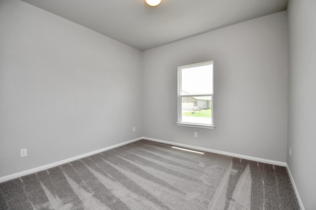 empty room with carpet floors