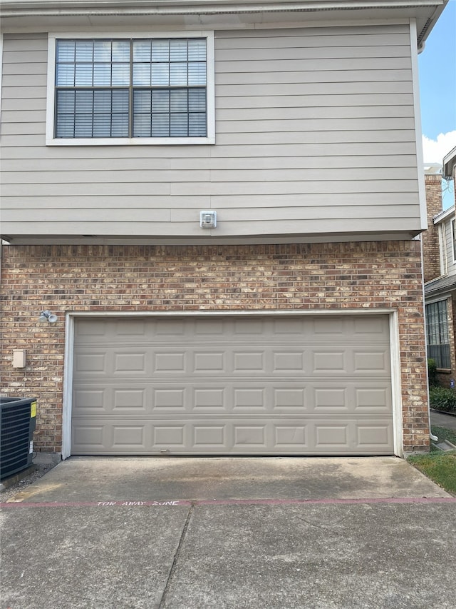 garage with central AC unit